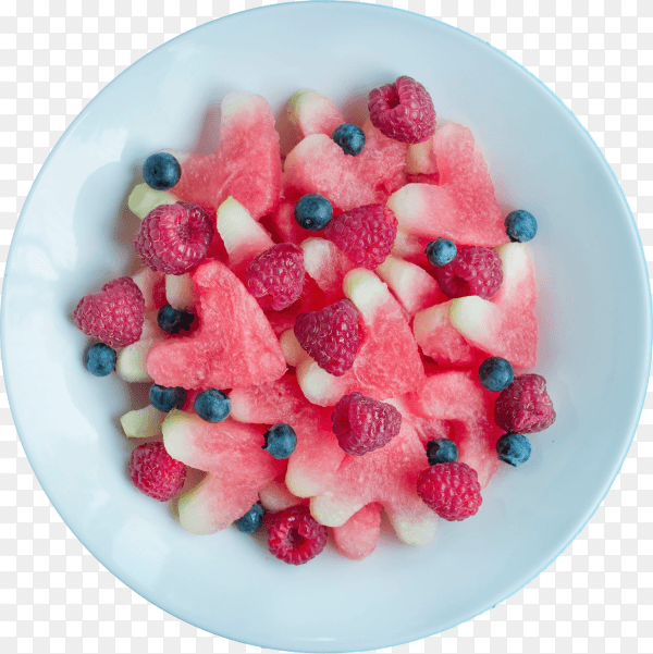 Salad of fruits and berries. light heart-shaped watermelon salad, raspberries, blueberries in a white plate on transparent background PNG