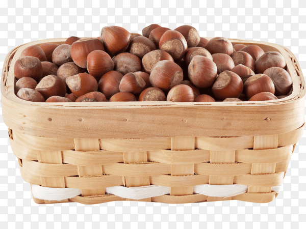 Basket with delicious hazelnuts isolated on transparent background PNG